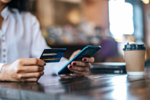 Pay goods by credit card through smartphone coffee shop